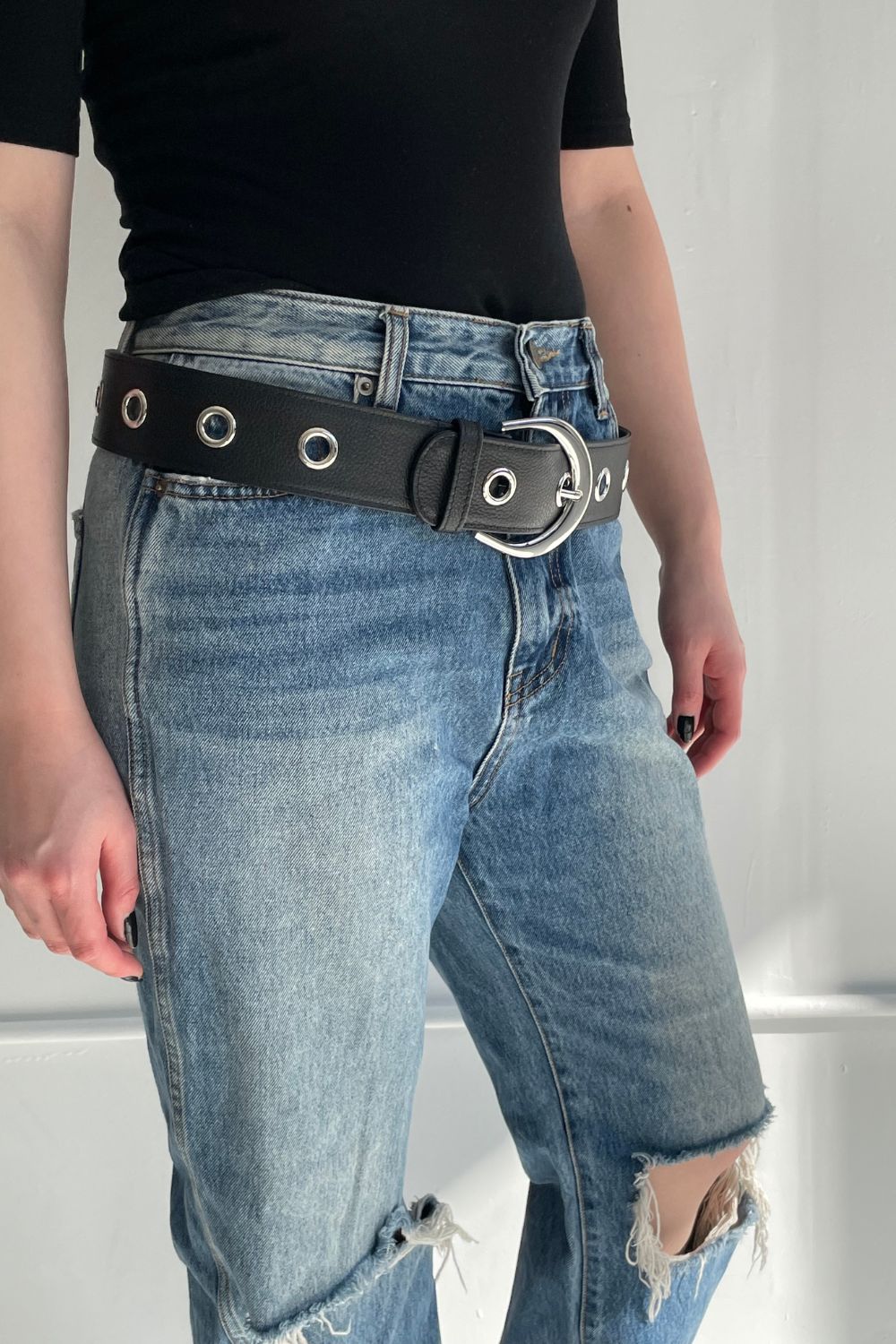 The Emie Grommet Belt in Black