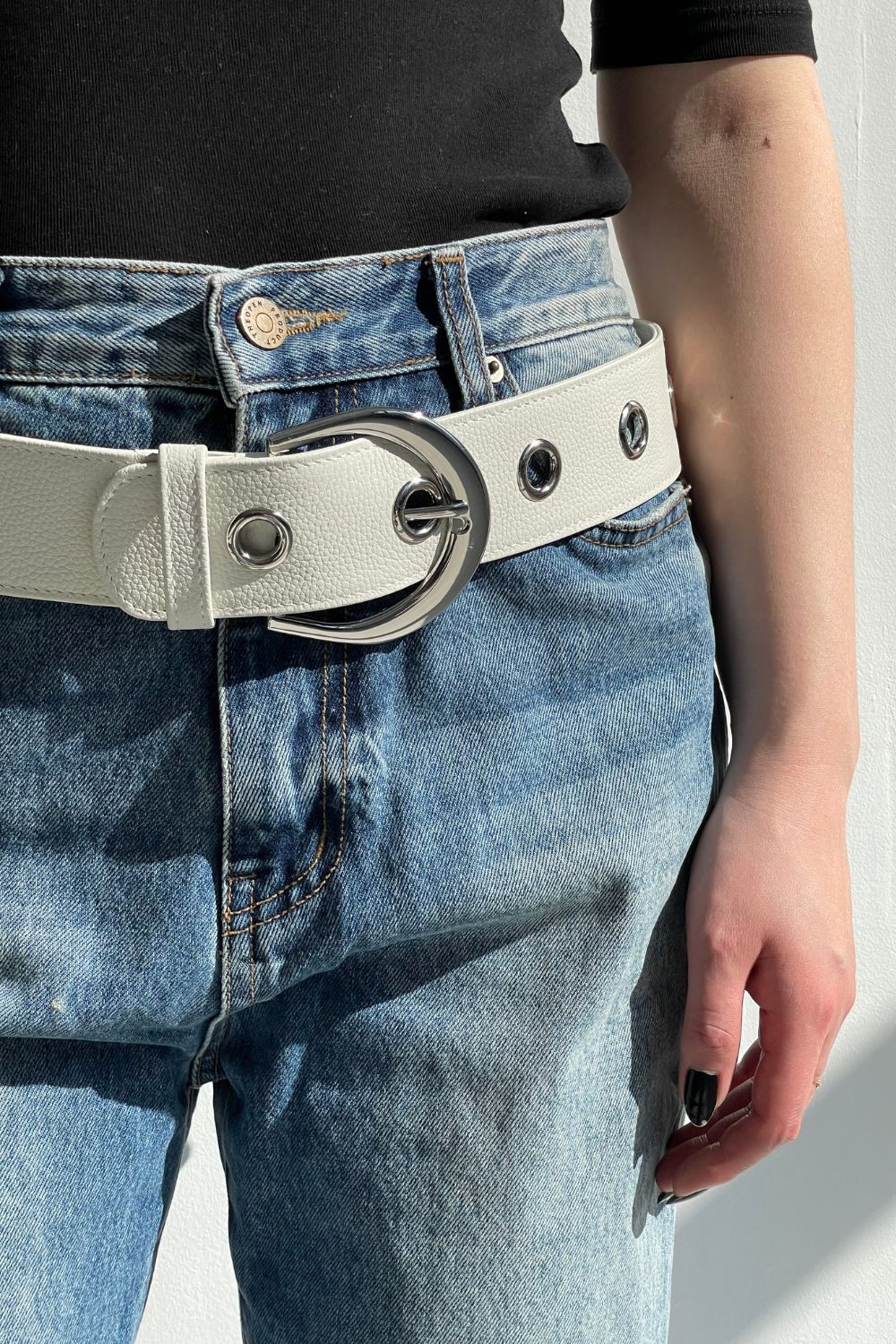 The Emie Grommet Belt in White