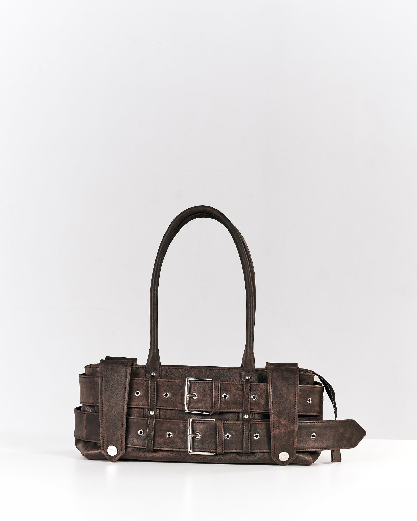 The Lewis Parallelo in Distressed Brown